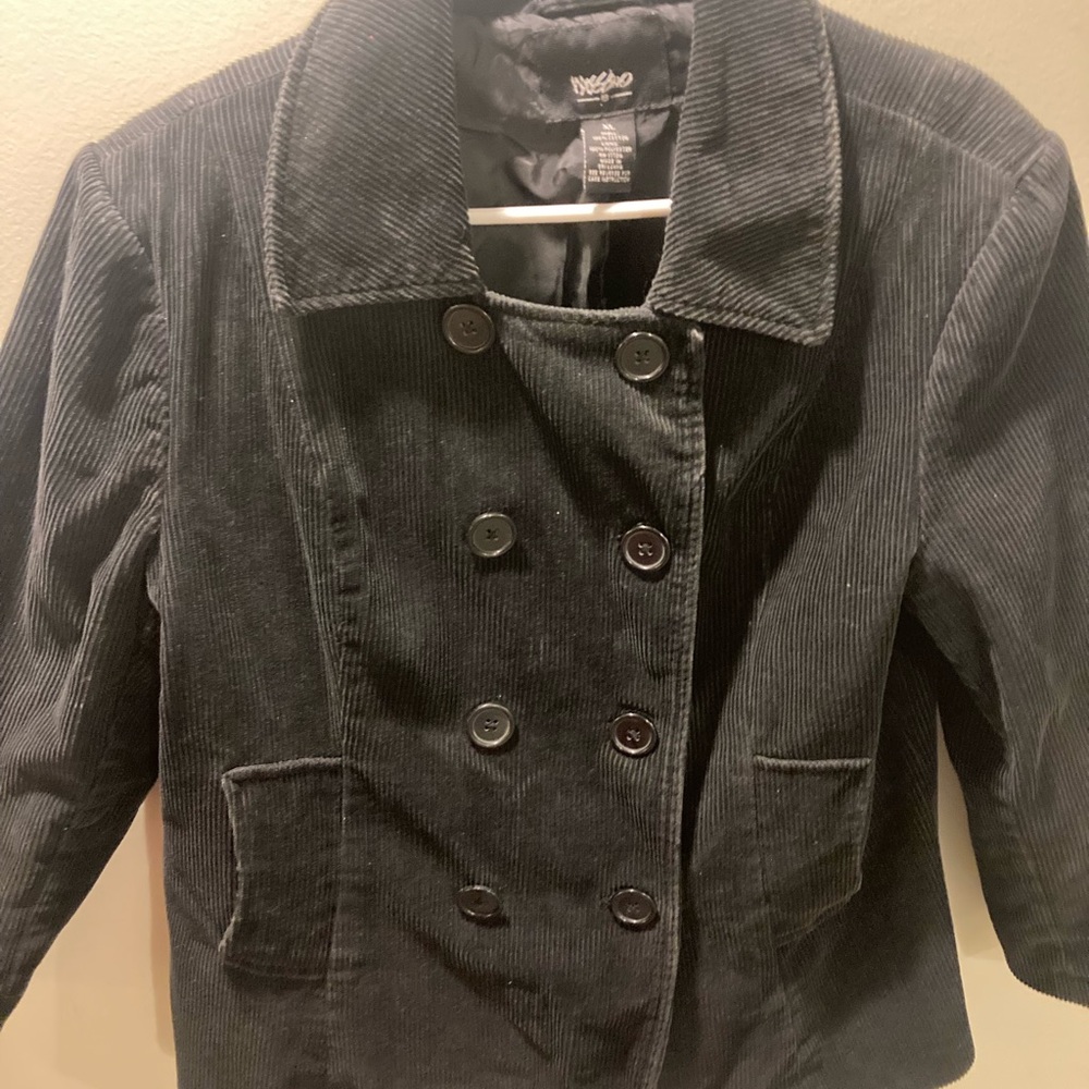 Vintage Corduroy Double-Breasted Jacket . Shoulder to hem 24 in.
waist 18 1/2 in